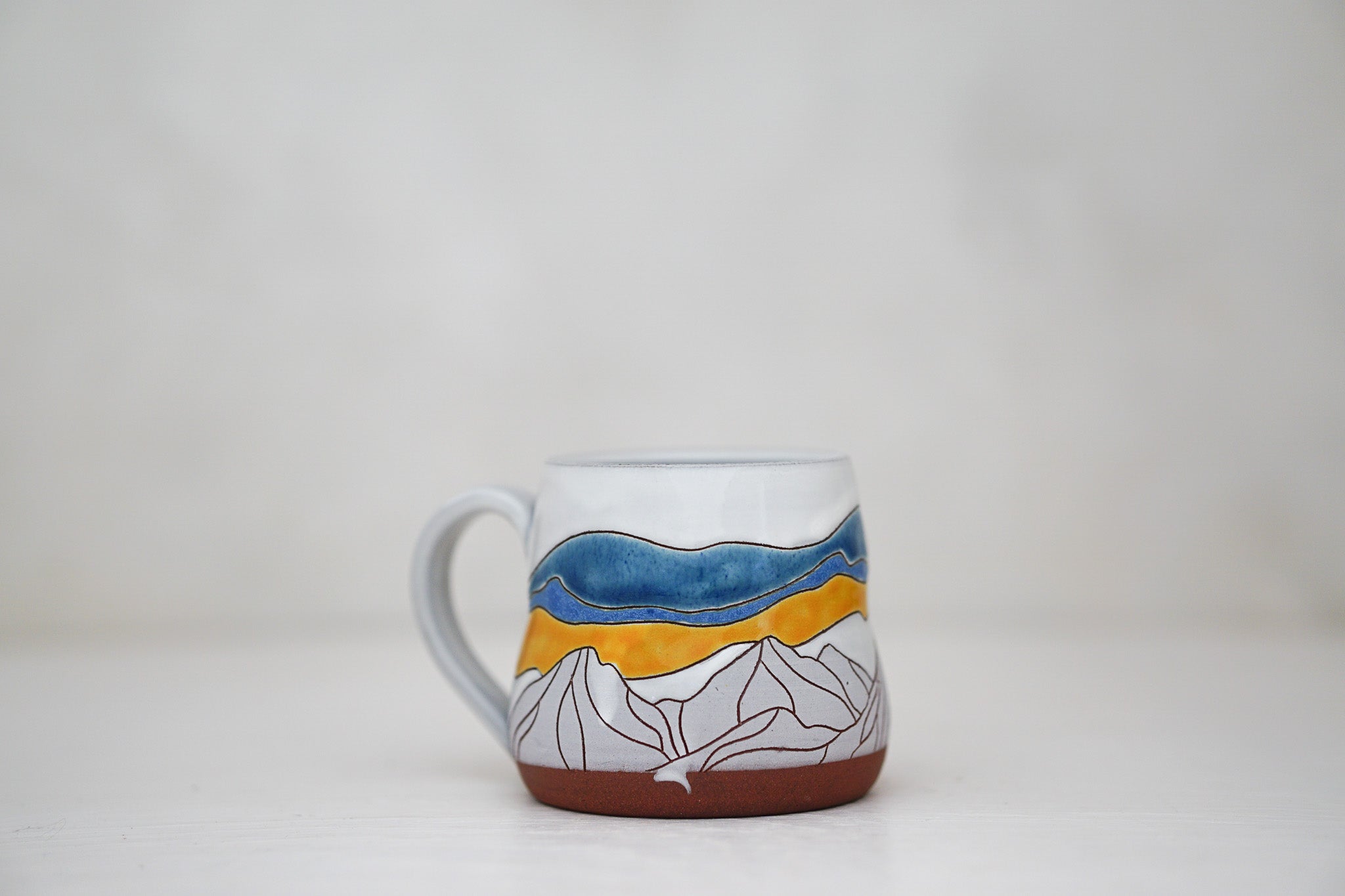 32. Mtn blues mug in white image 3