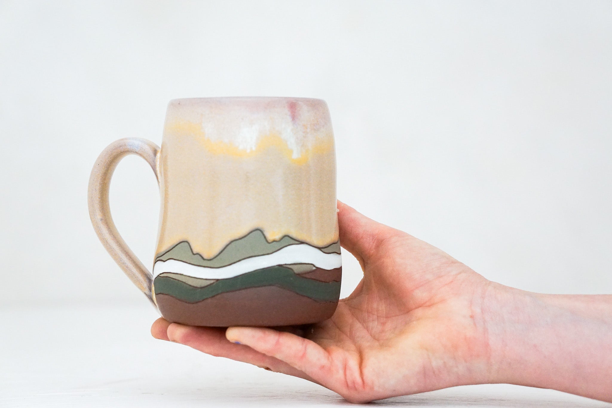 Wavy Cabin in the Flowers mug in Alpenglow*