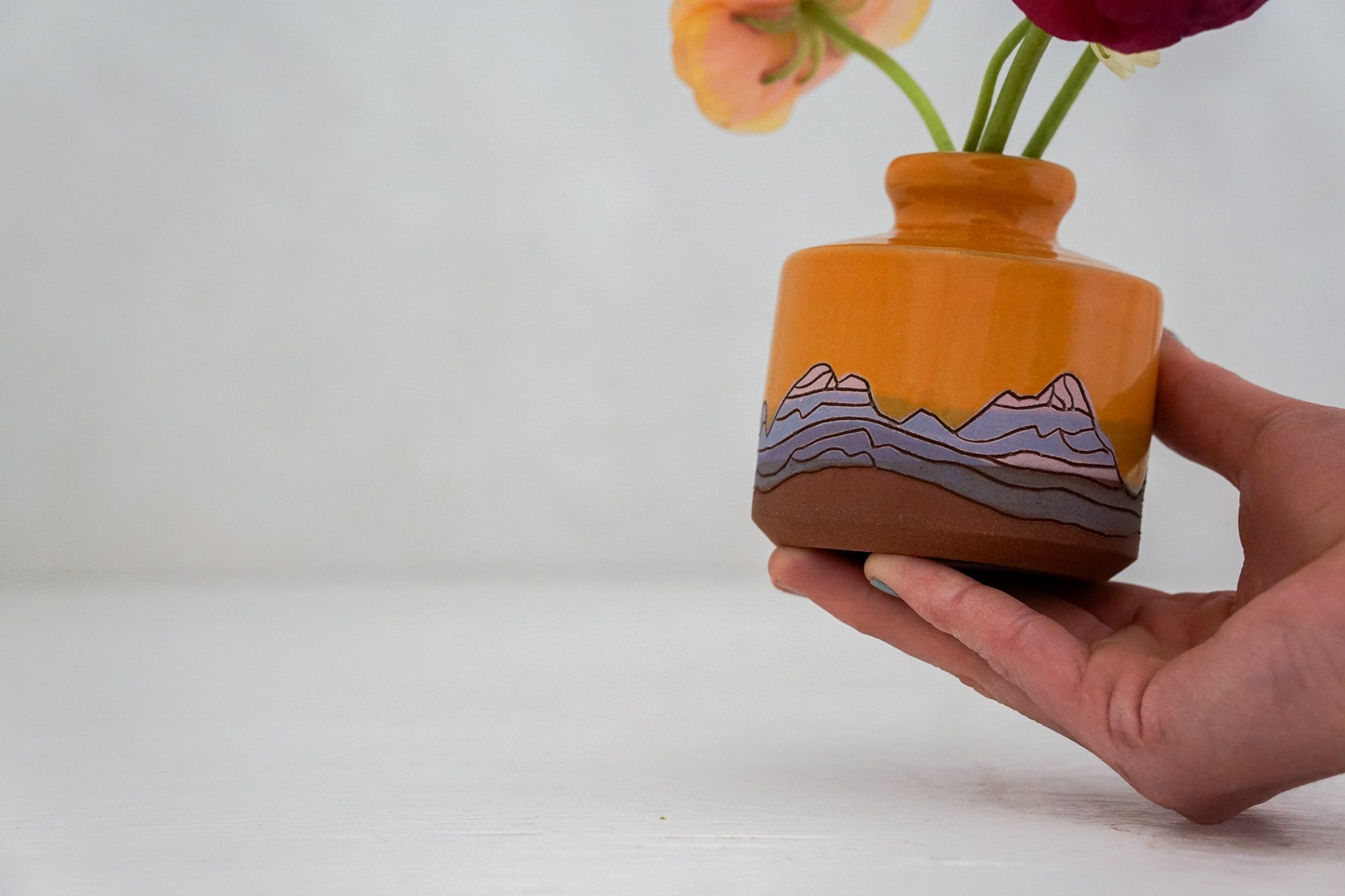 E Teton in Tang Budvase