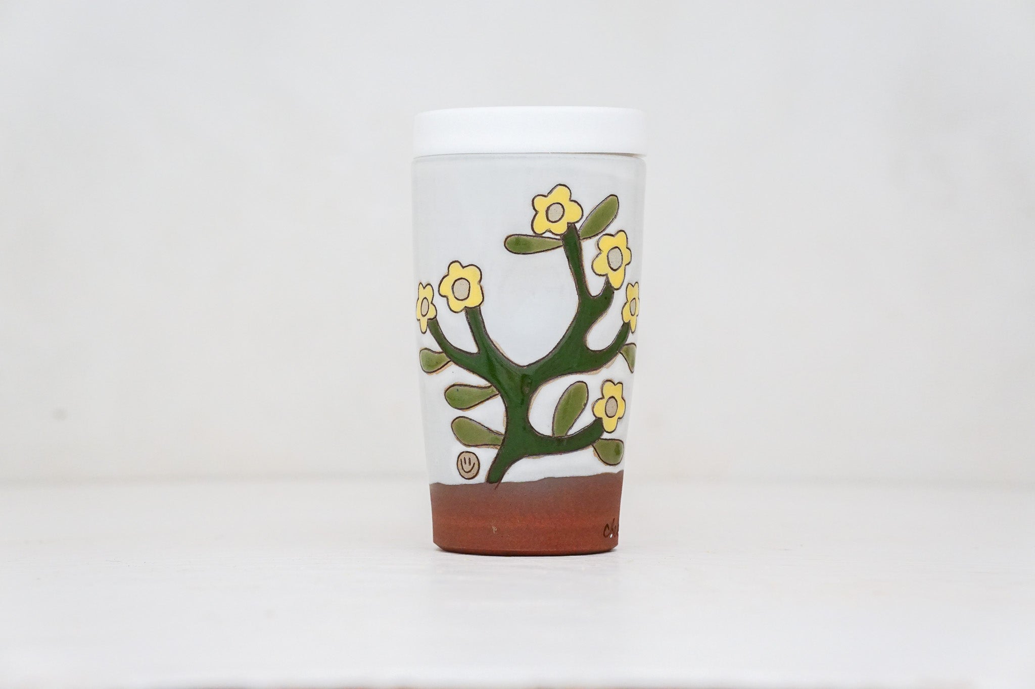 Lil Yellow Flower Travel Cup in White