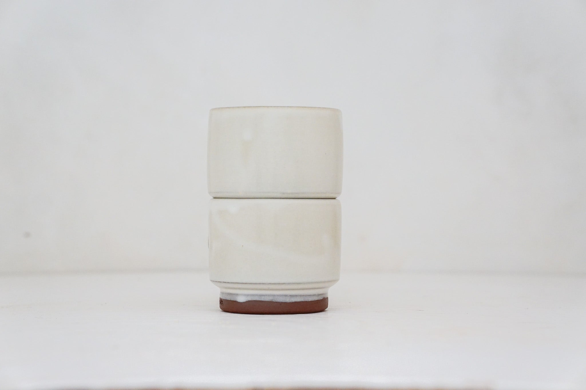 Buttercup flower double stack cups in Bone