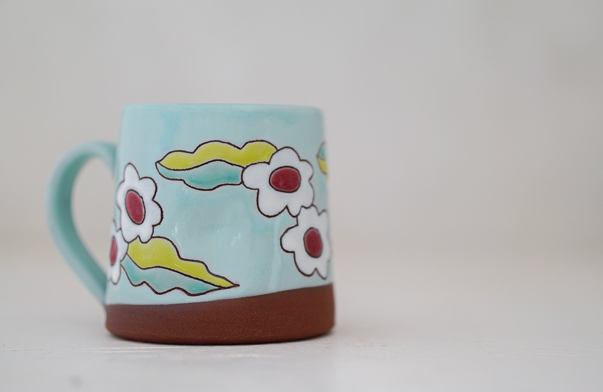 Pinched flower mug