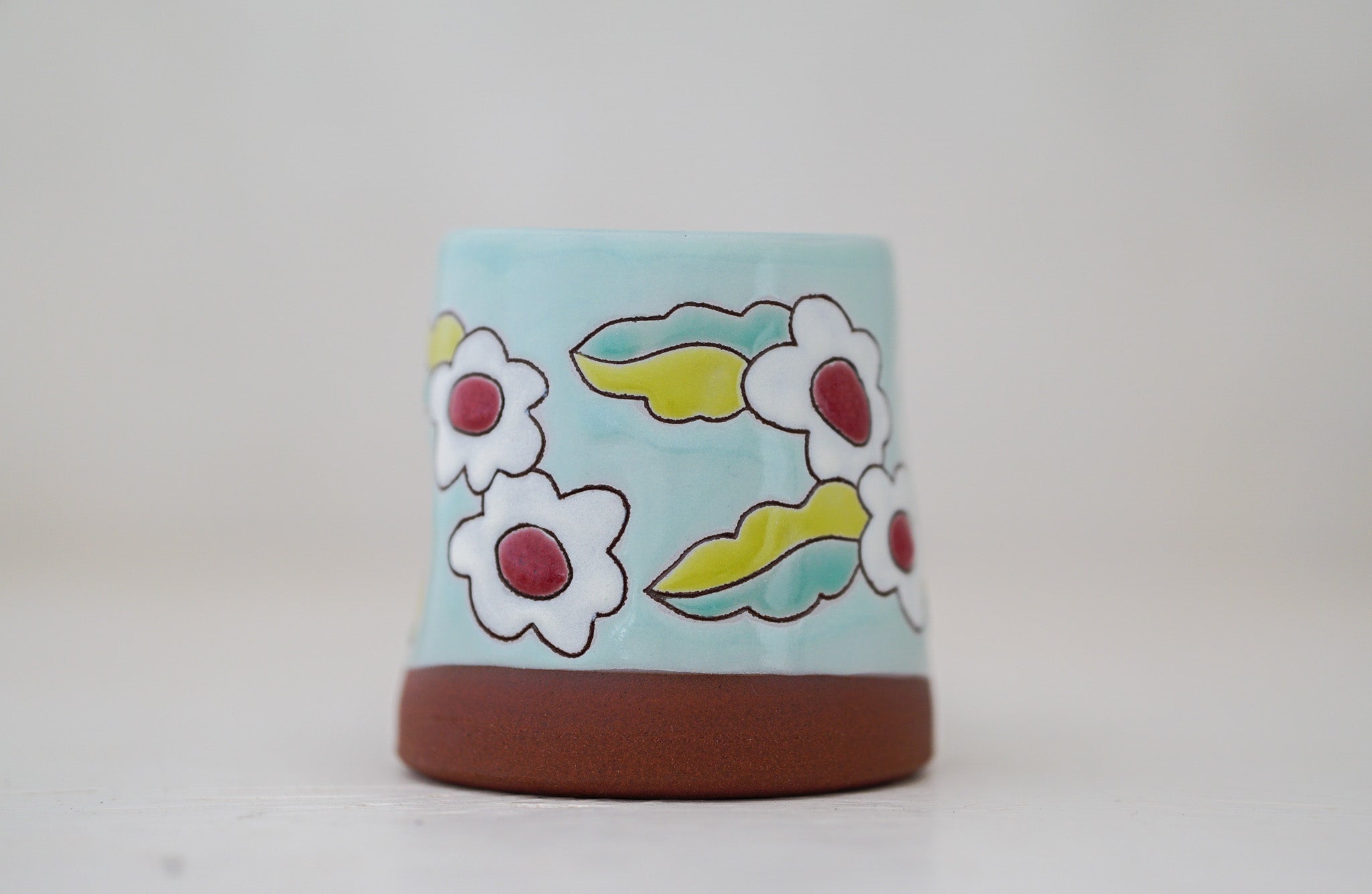 Pinched flower mug