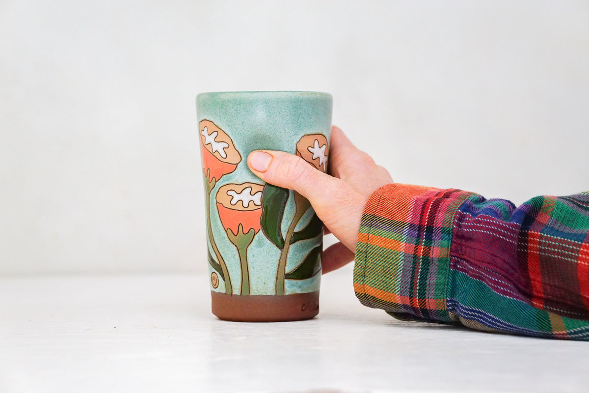 Orange Flowers Tall Cup in Lake