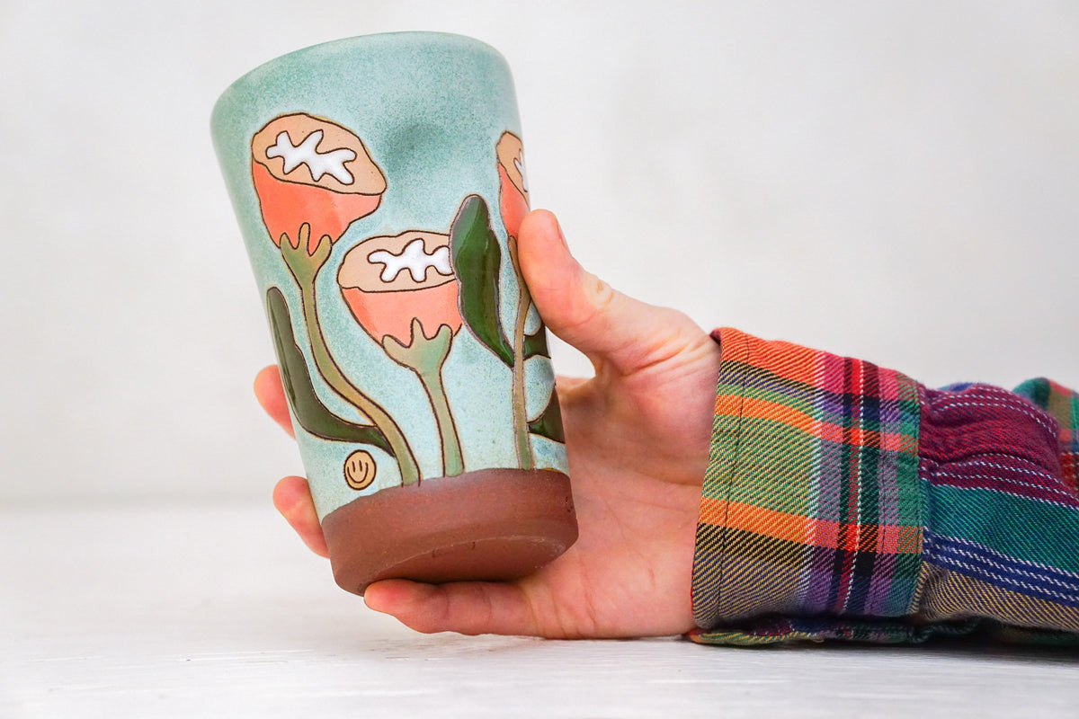 Orange Flowers Tall Cup in Lake