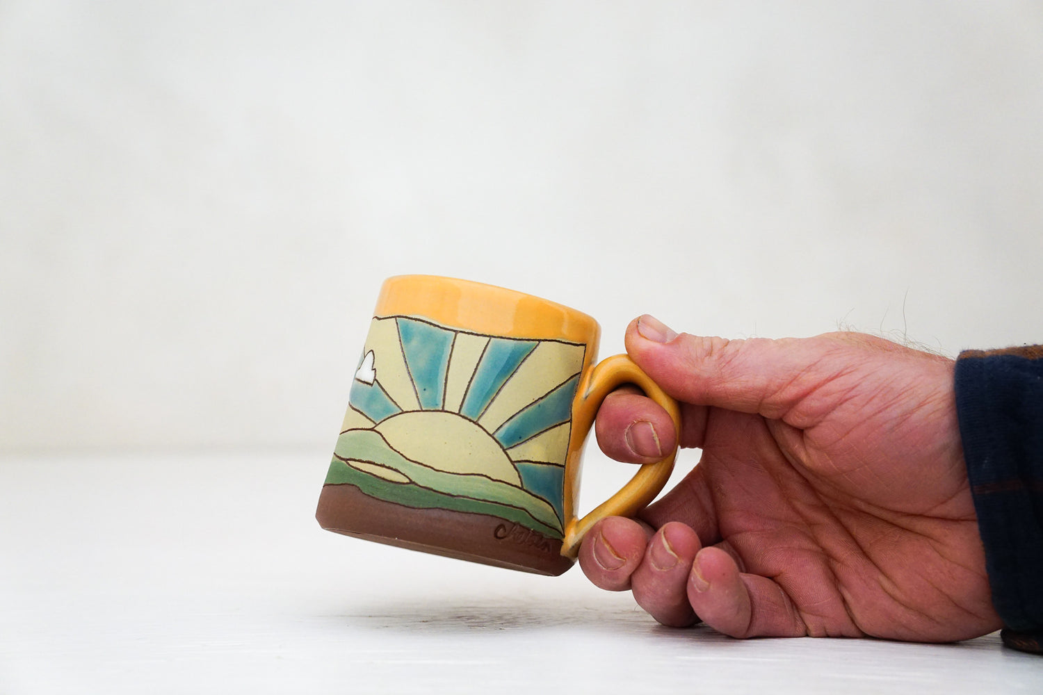 Sunburst Tiny mug in TangX
