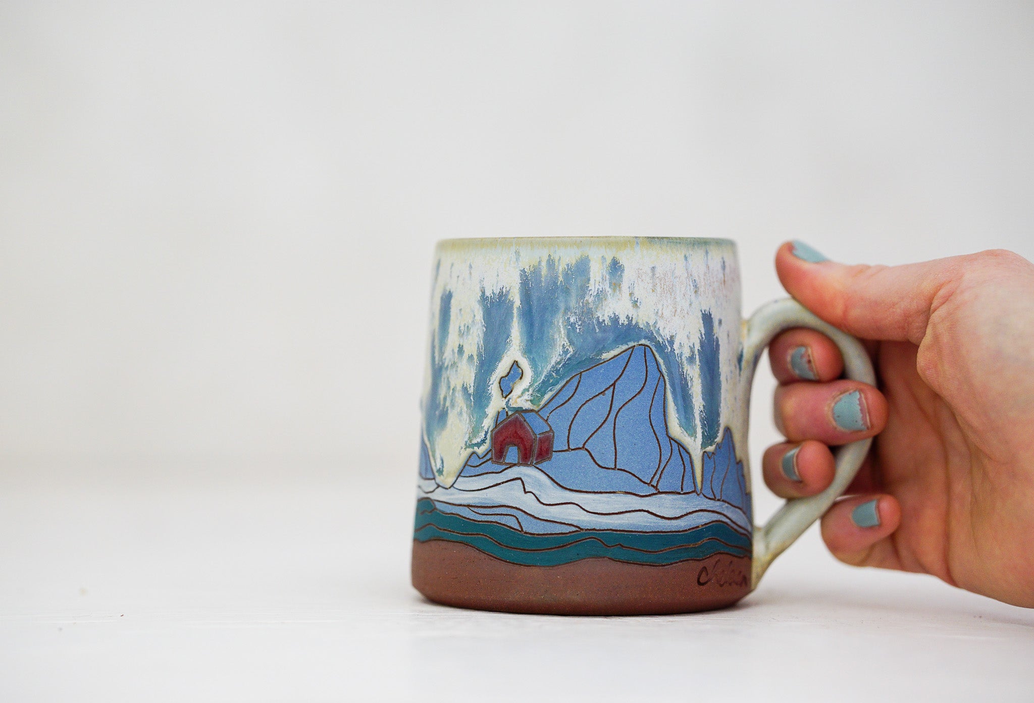 E Teton red home mug in Bone and Speck