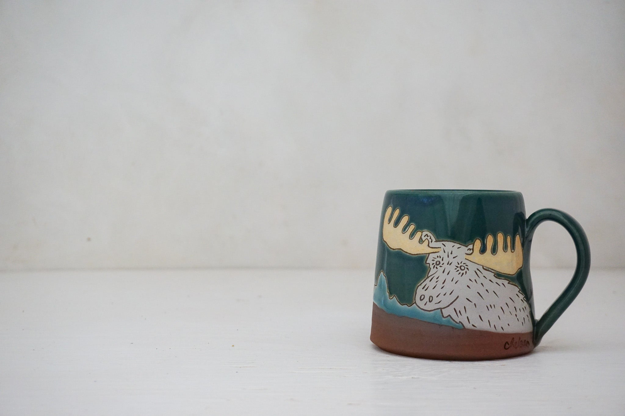 W Teton Moose mug in Huckleberry