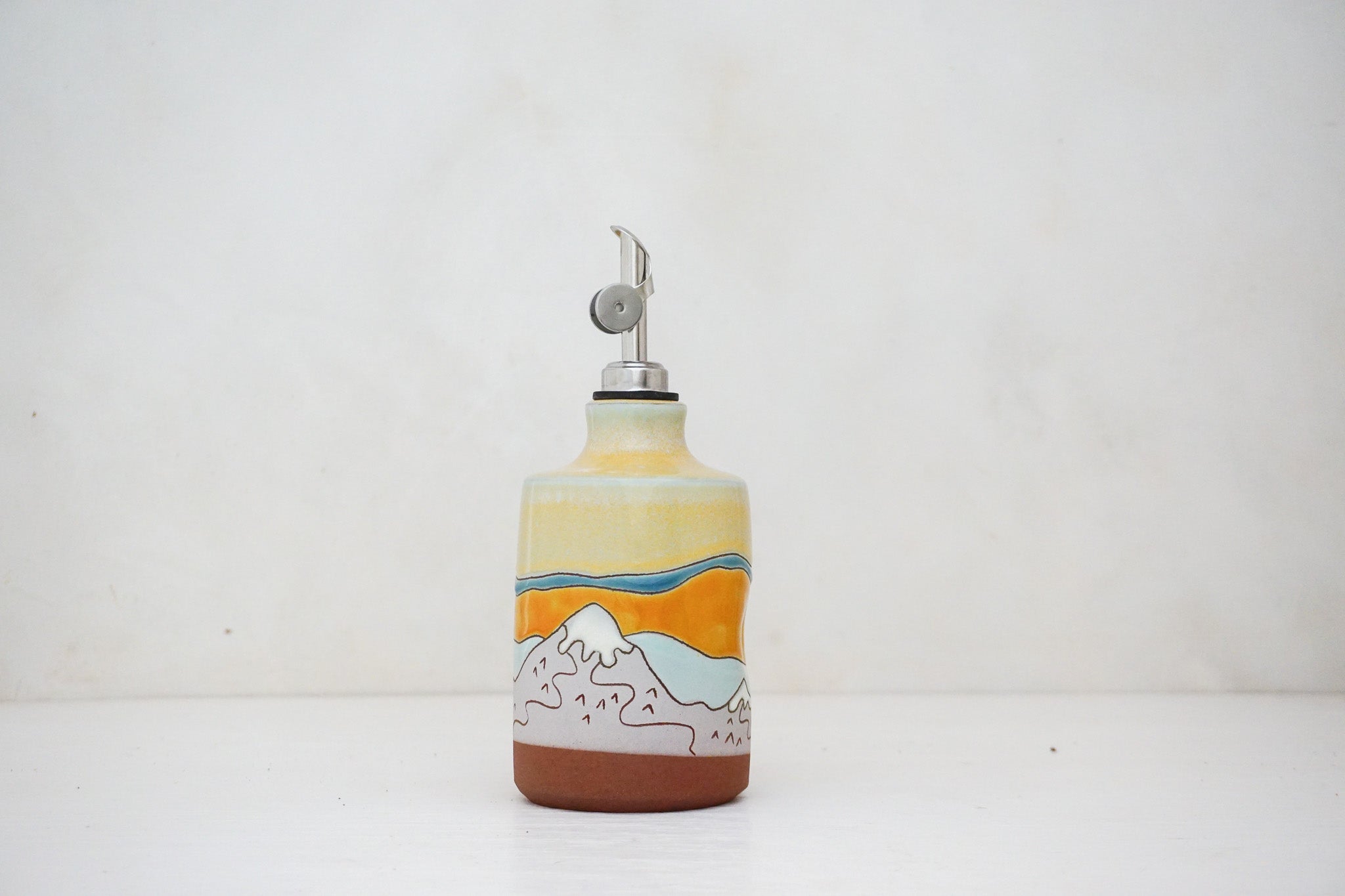 Skylines Olive Oil Pour in Ira Peach