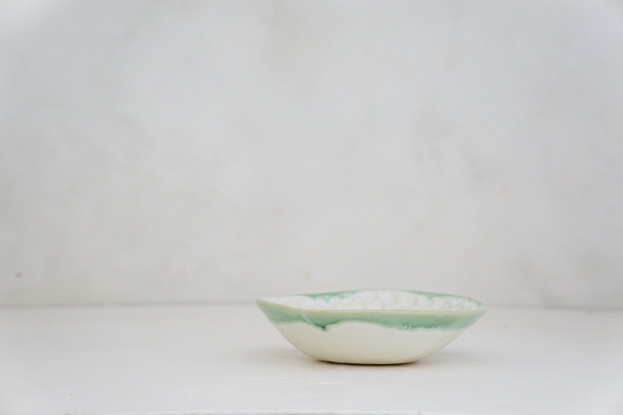 Handbuilt Thumbprint bowl in White