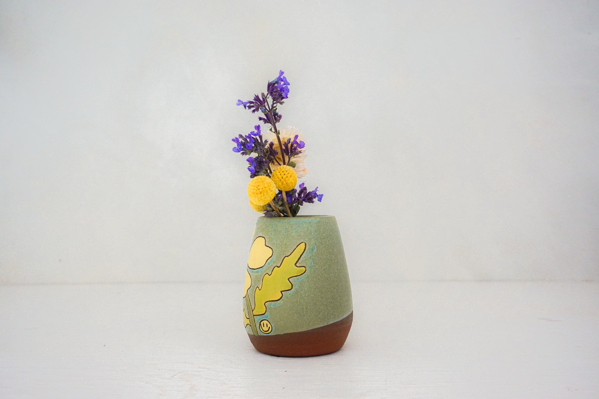 Yellow flower vase in LAKE
