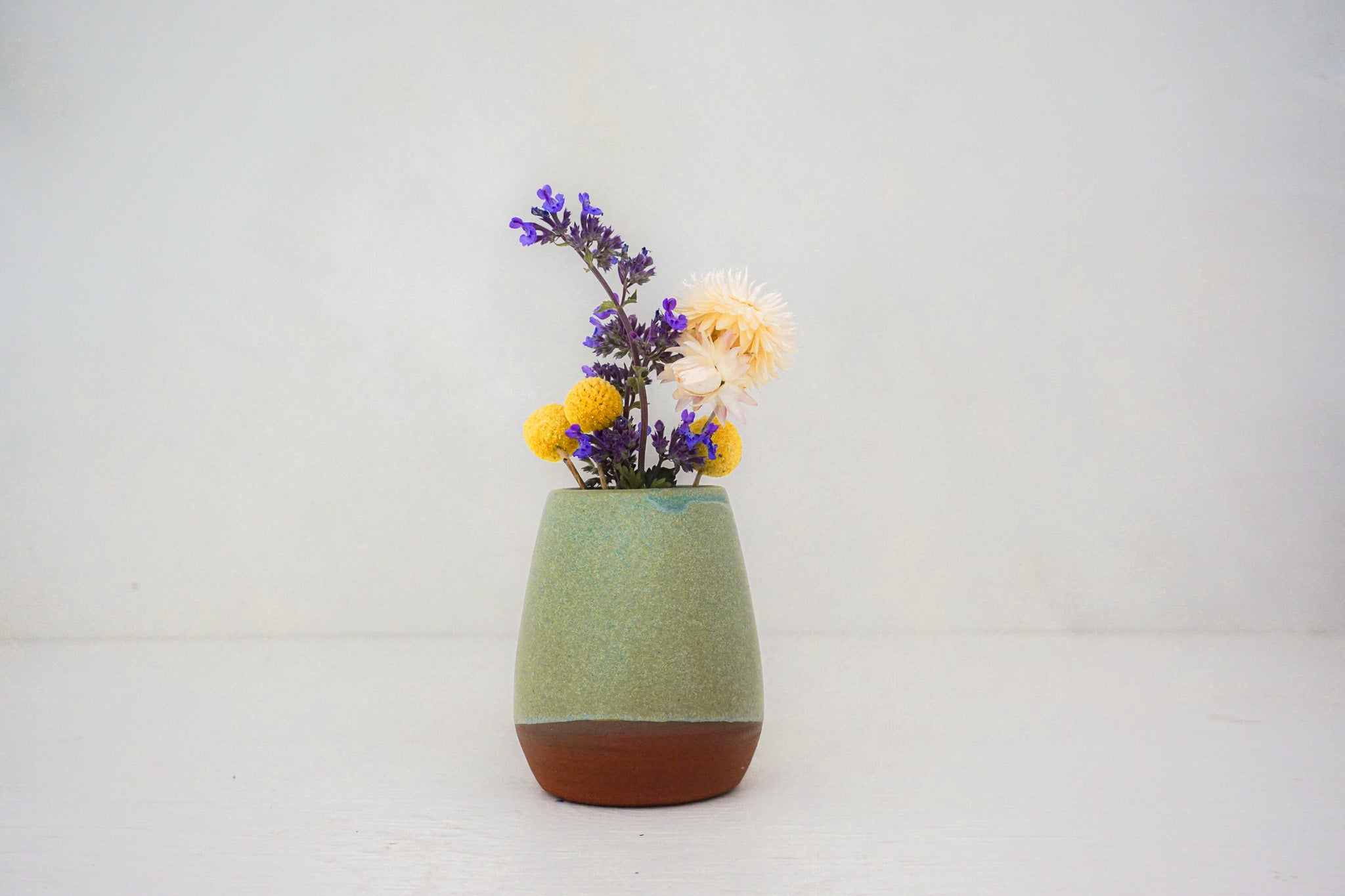 Yellow flower vase in LAKE