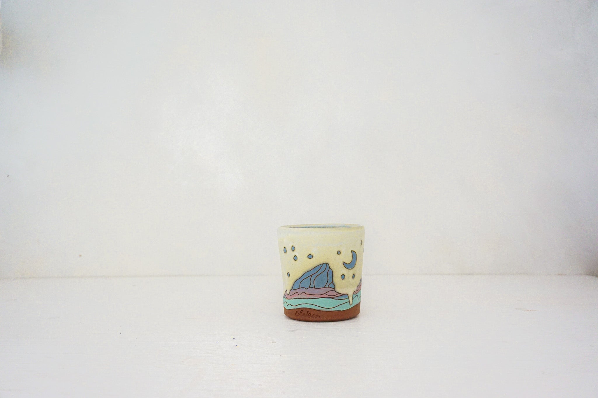 E Teton stars blue cup in BONE