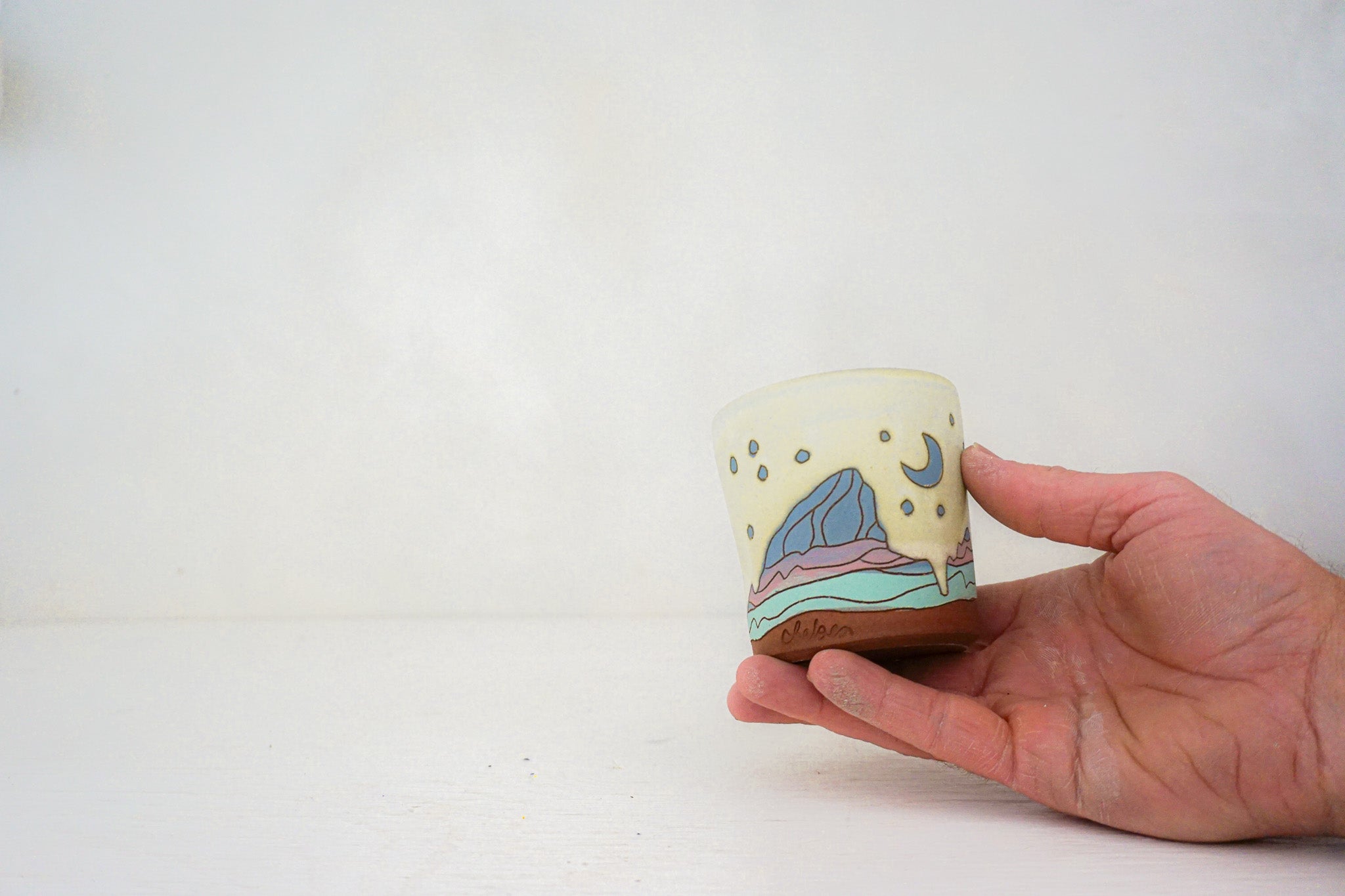 E Teton stars blue cup in BONE