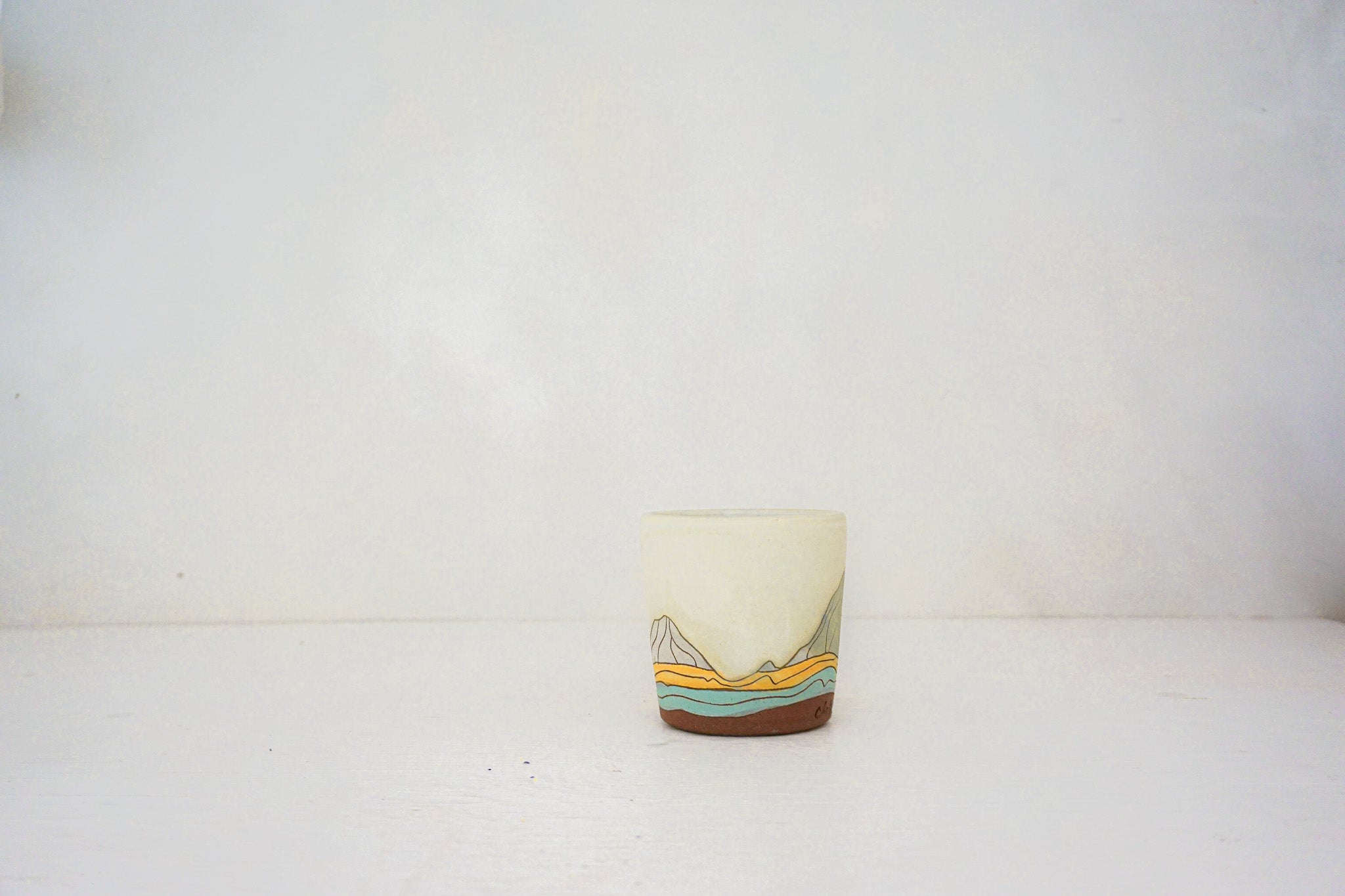 E Teton marble slipped cup in BONE