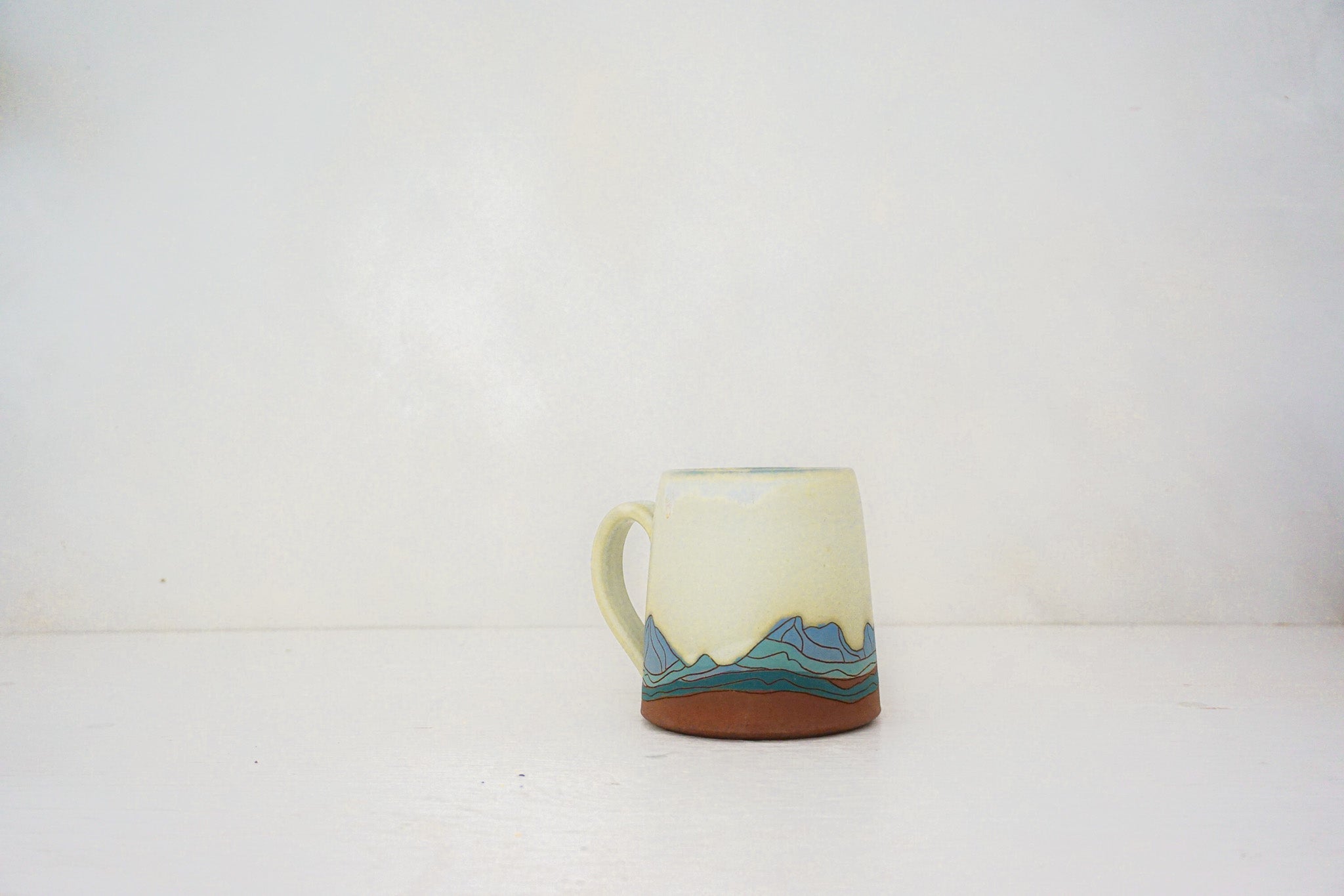 W Teton blue mug in BONE 2
