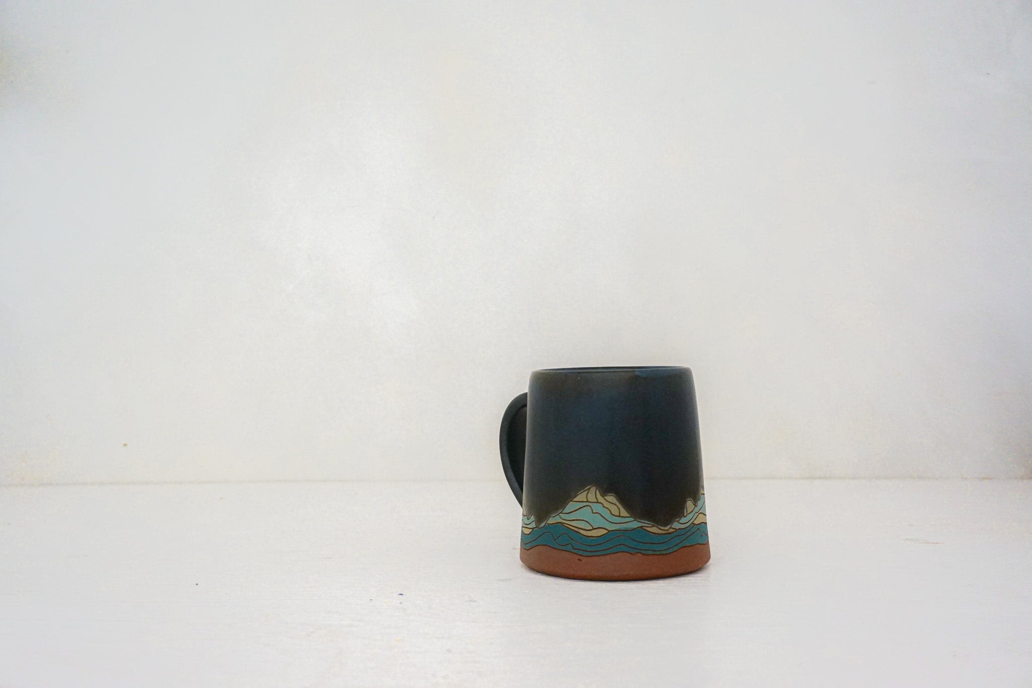 W Teton green mug in DARBY