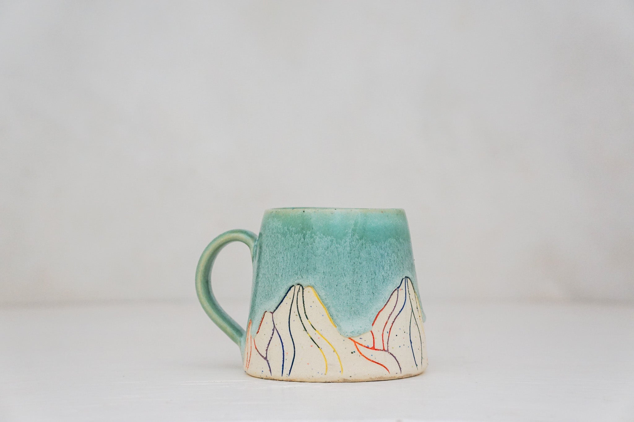E Teton Colored Grog mug in Ira Magic