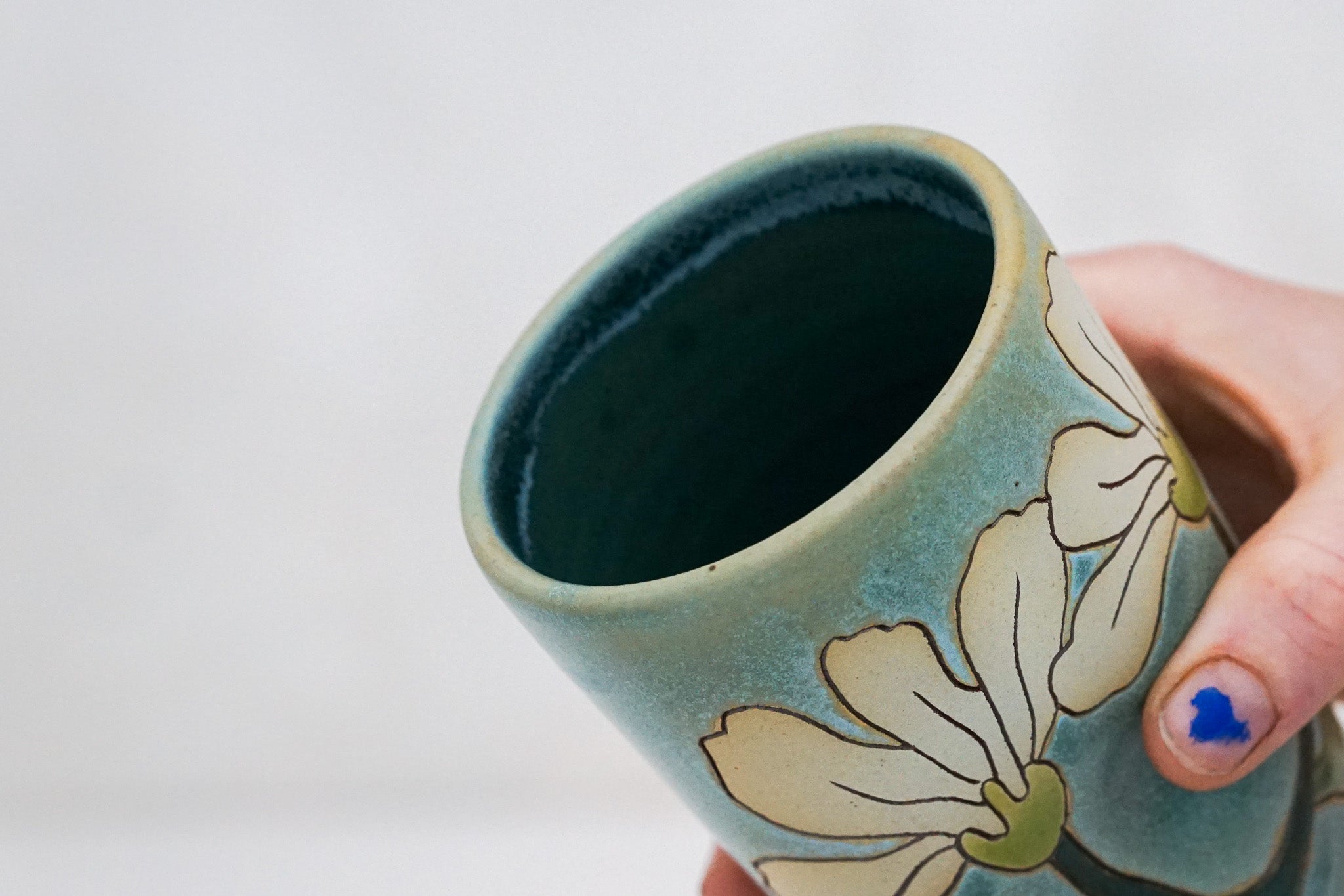 Flowers have poweres travel cup in Lake