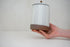 Glossy white glaze stripes on flat white slip Tall jar image 0