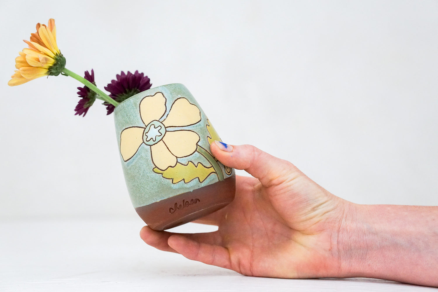 Yellow Flower vase in Lake