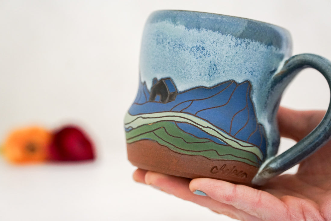 House on a hill Mug