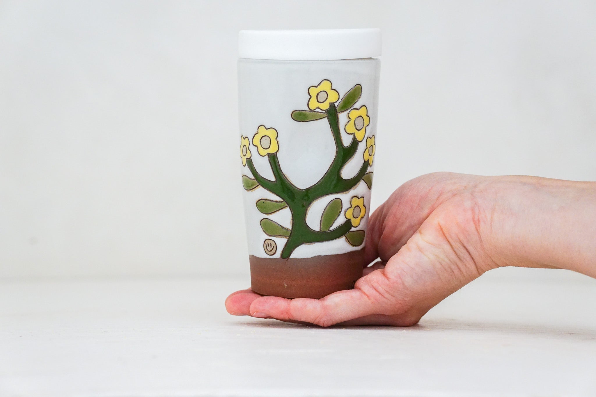 Lil Yellow Flower Travel Cup in White