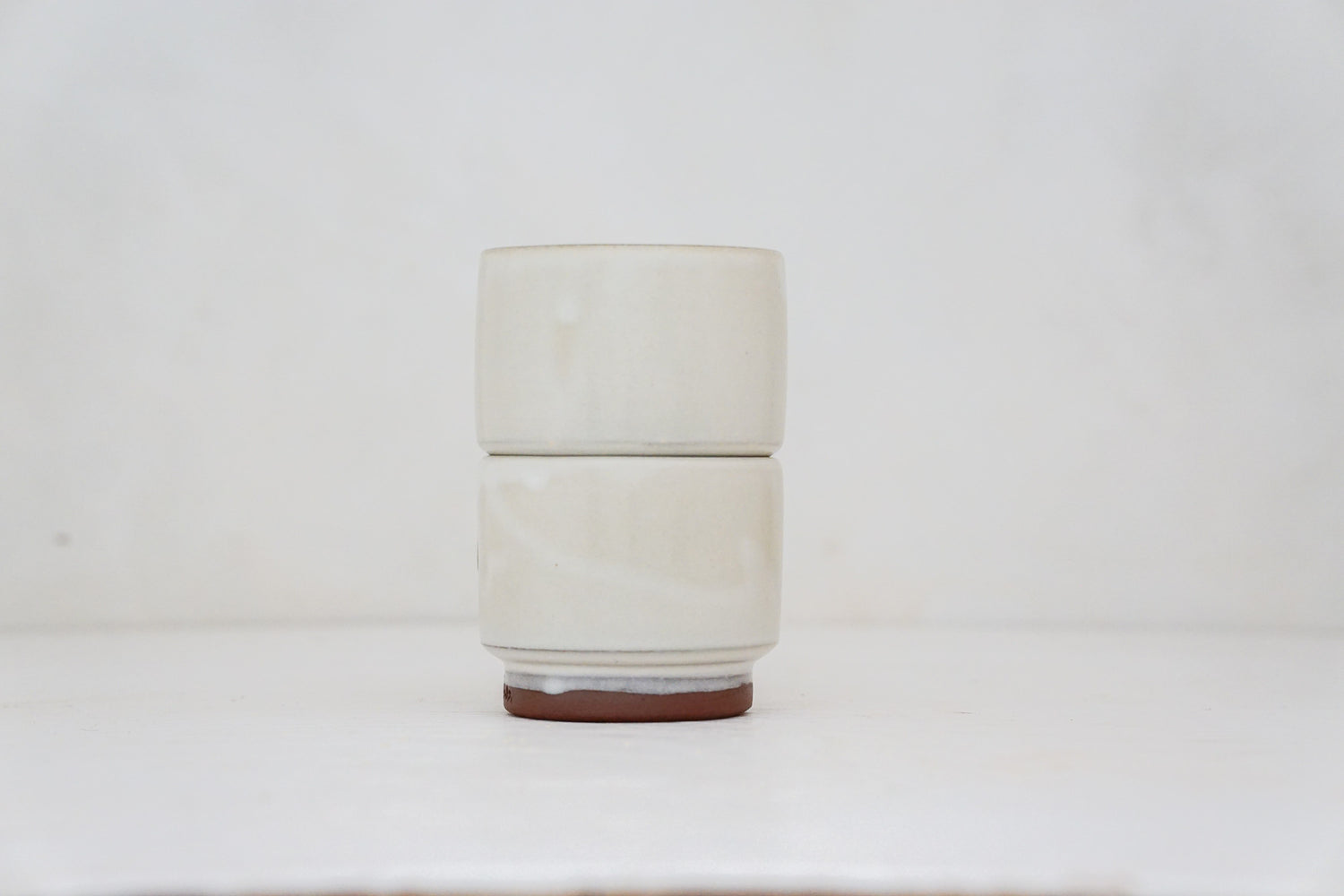 Buttercup flower double stack cups in Bone