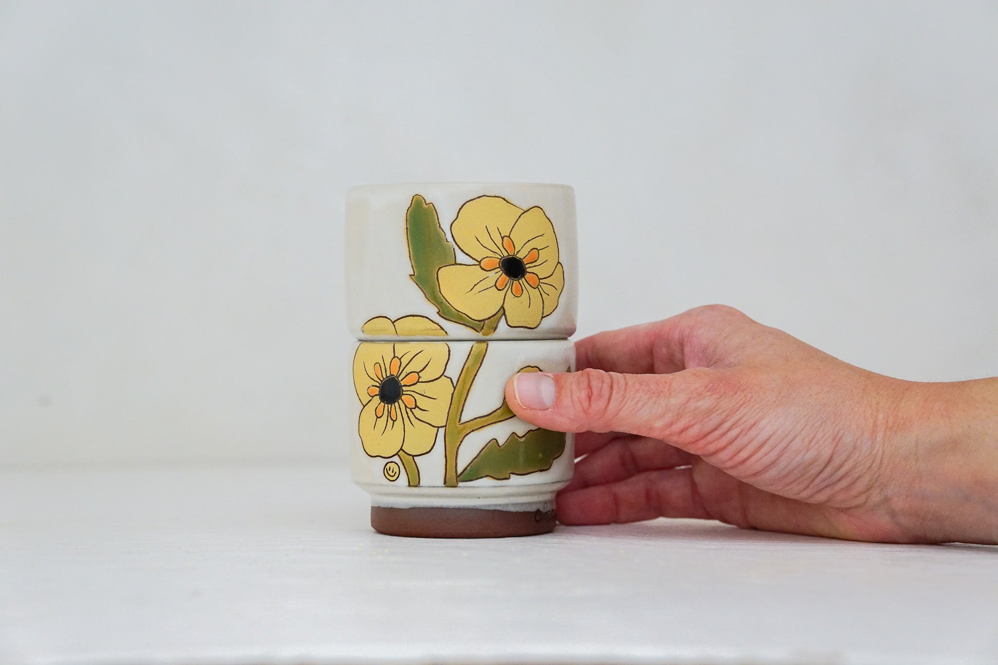 Buttercup flower double stack cups in Bone