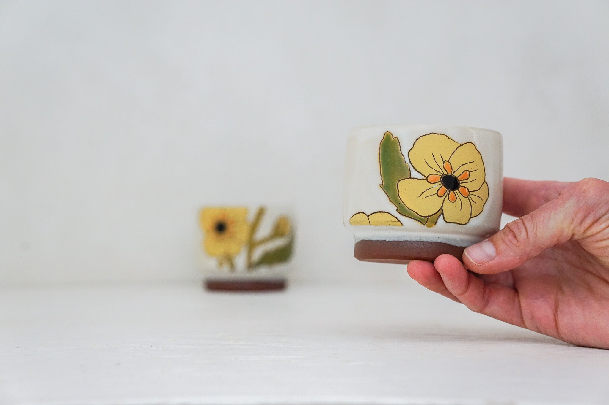 Buttercup flower double stack cups in Bone