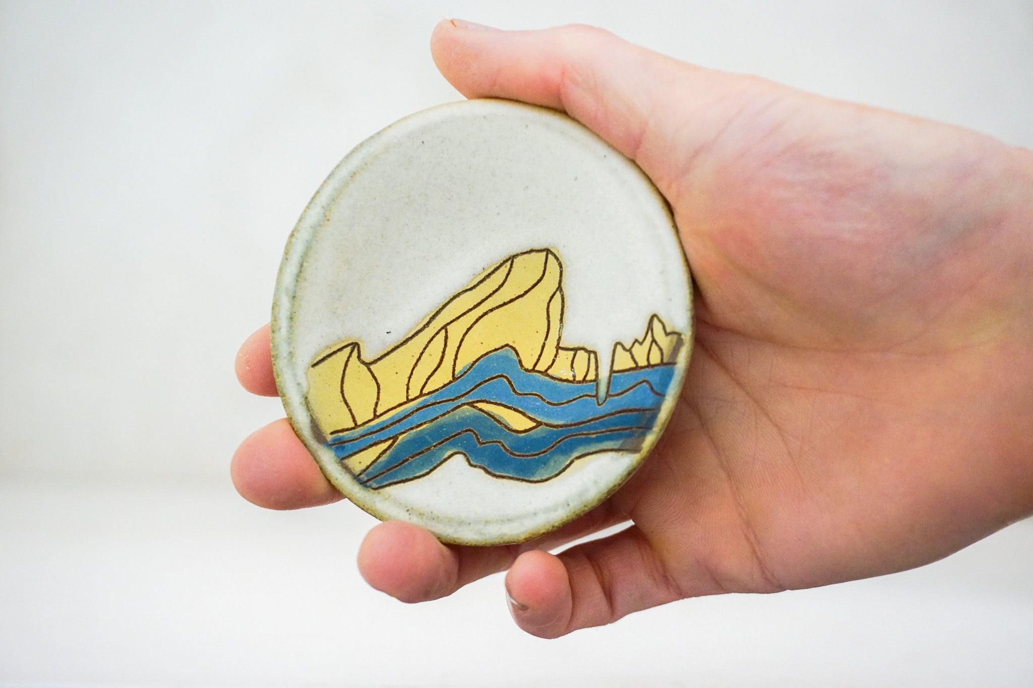 E Teton Yellow ring dish in Bone