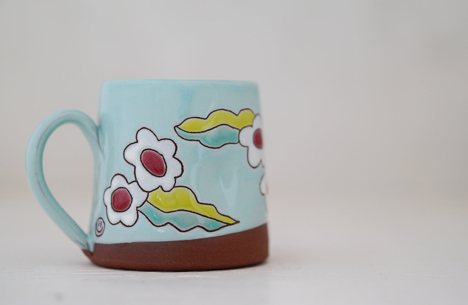 Pinched flower mug