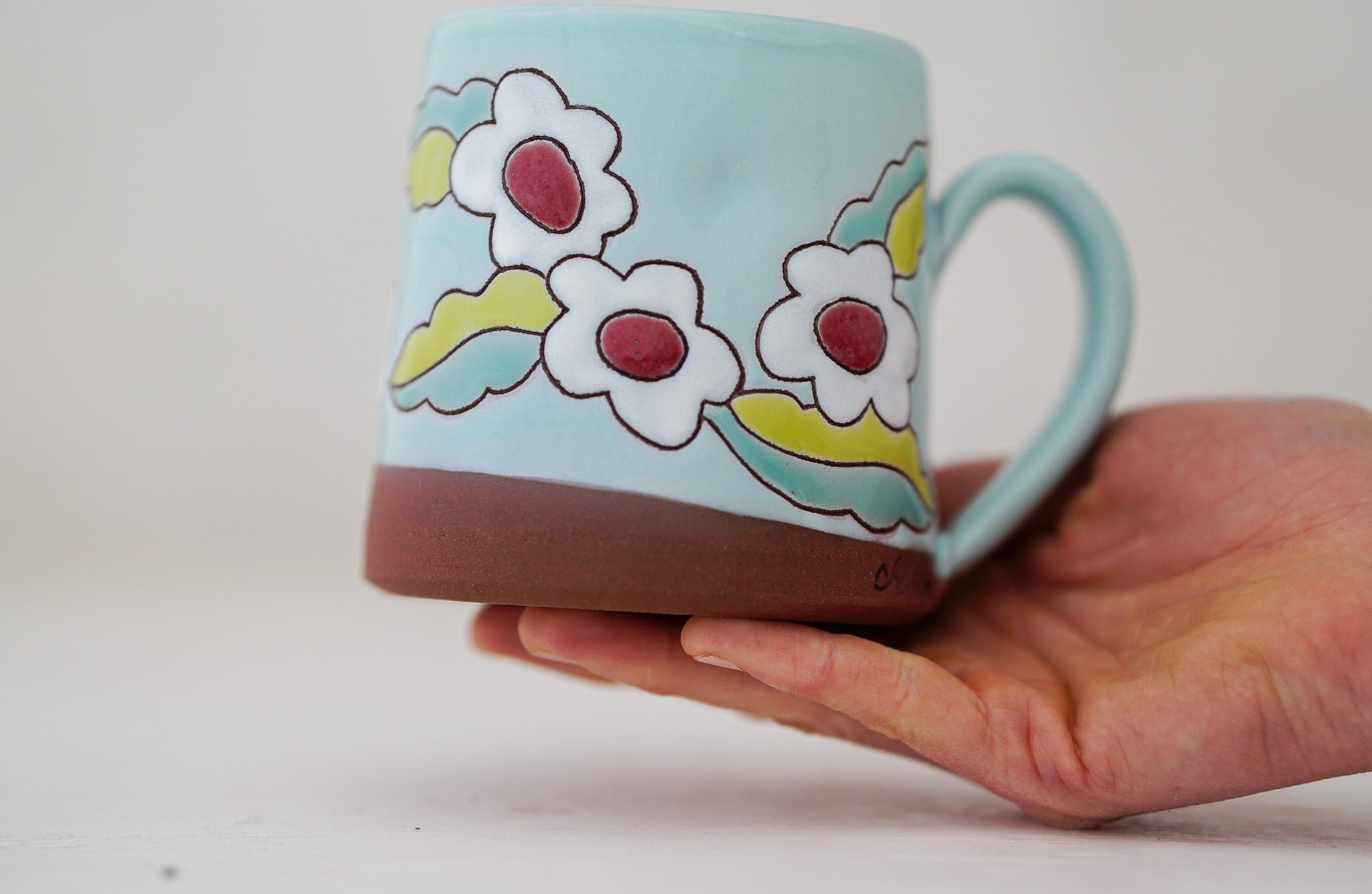 Pinched flower mug
