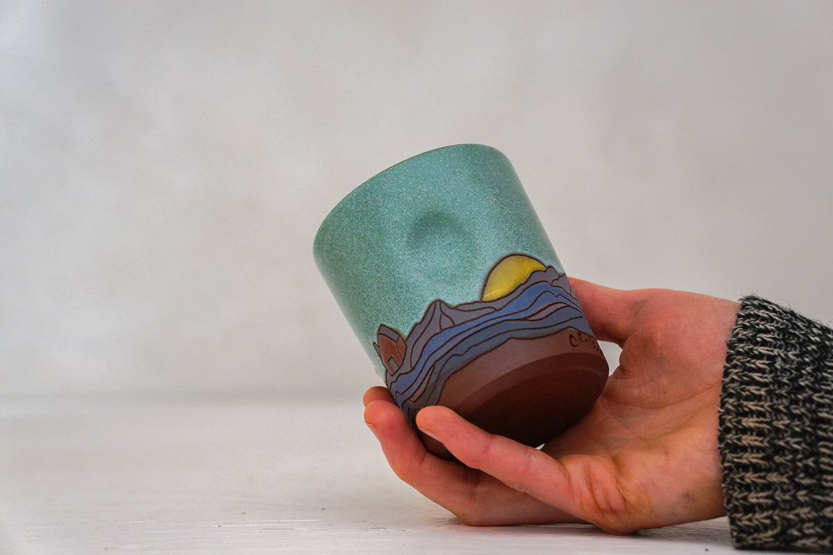 Yellow Sunrise Mountain cup In Lake