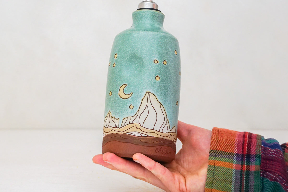 W Teton Stars Olive oil Bottle in Lake