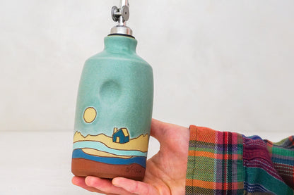 Home Olive oil Bottle in Lake