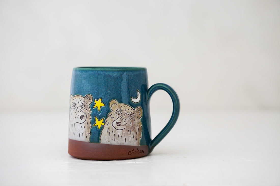 Bear moon stars mug in Huckleberry