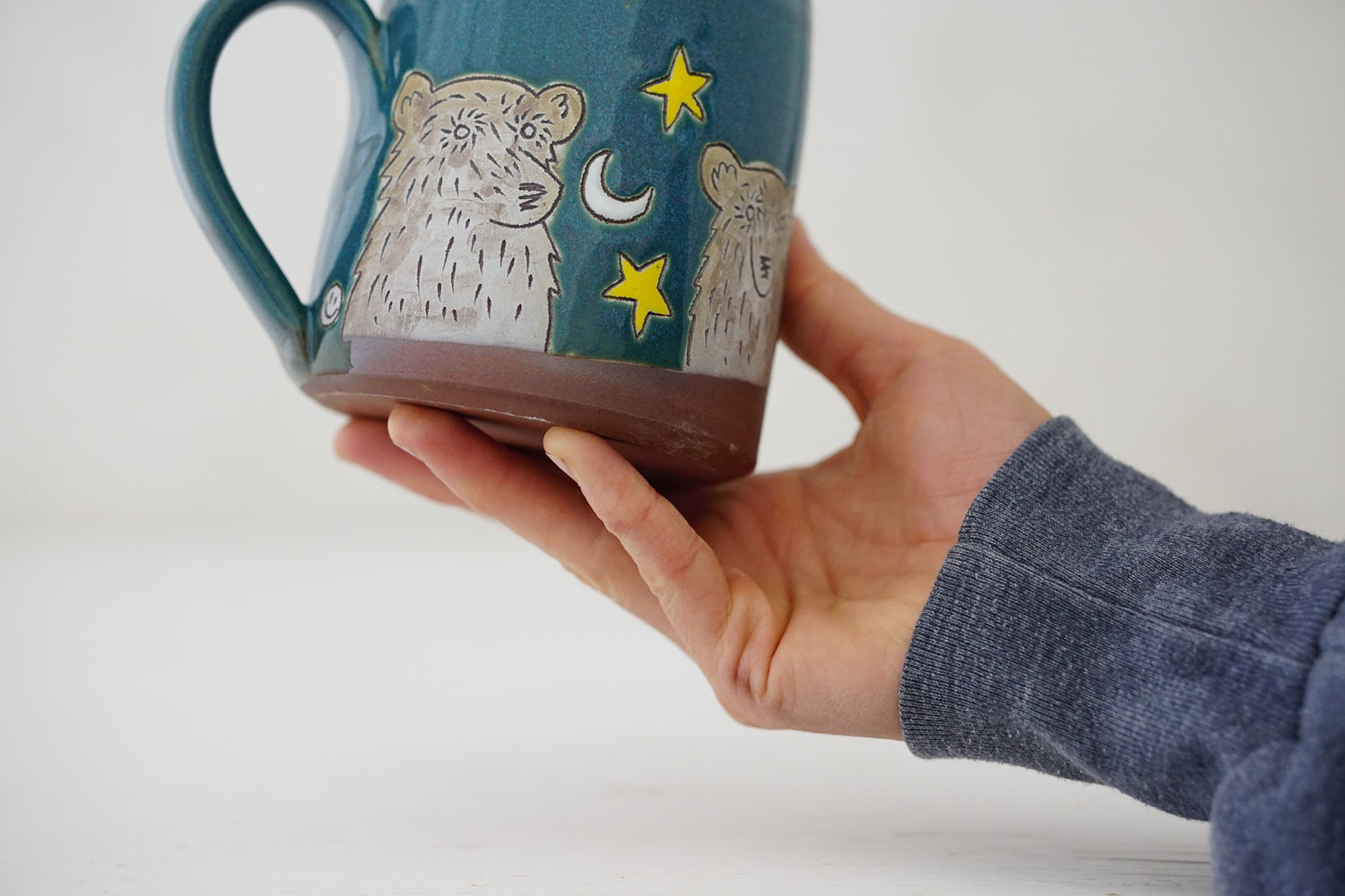 Bear moon stars mug in Huckleberry