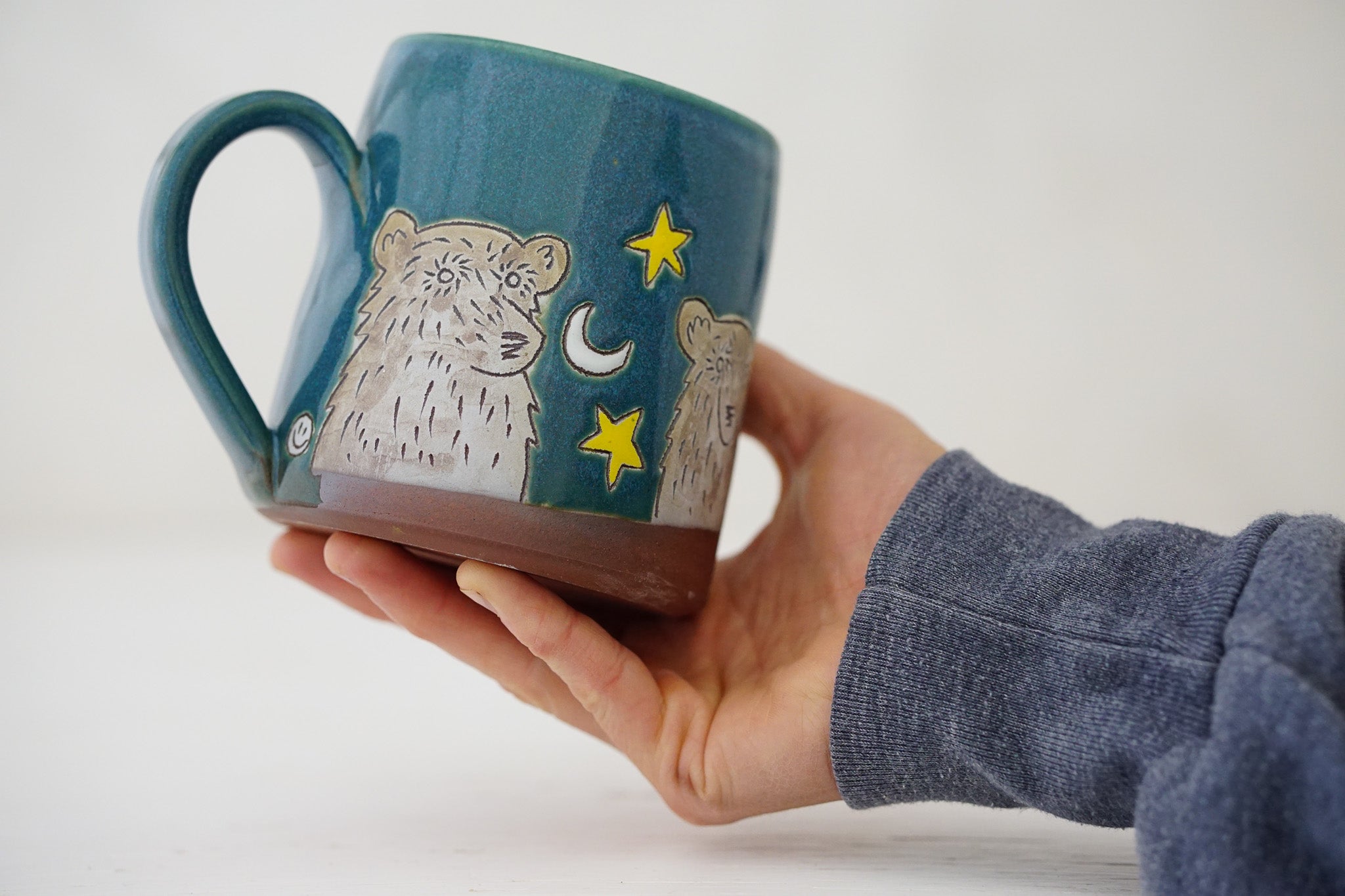 Bear moon stars mug in Huckleberry