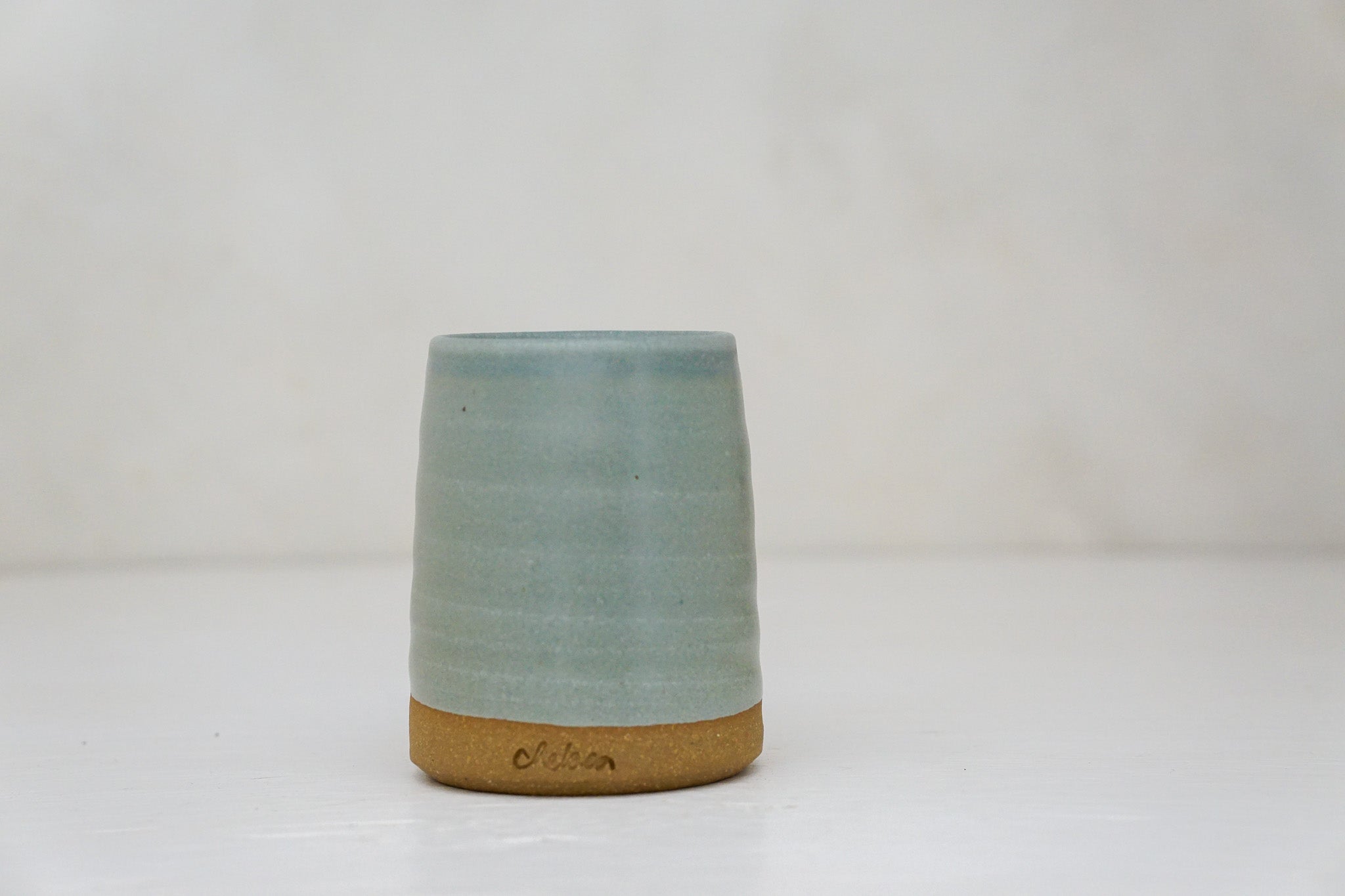 Brown clay Cup in Stone