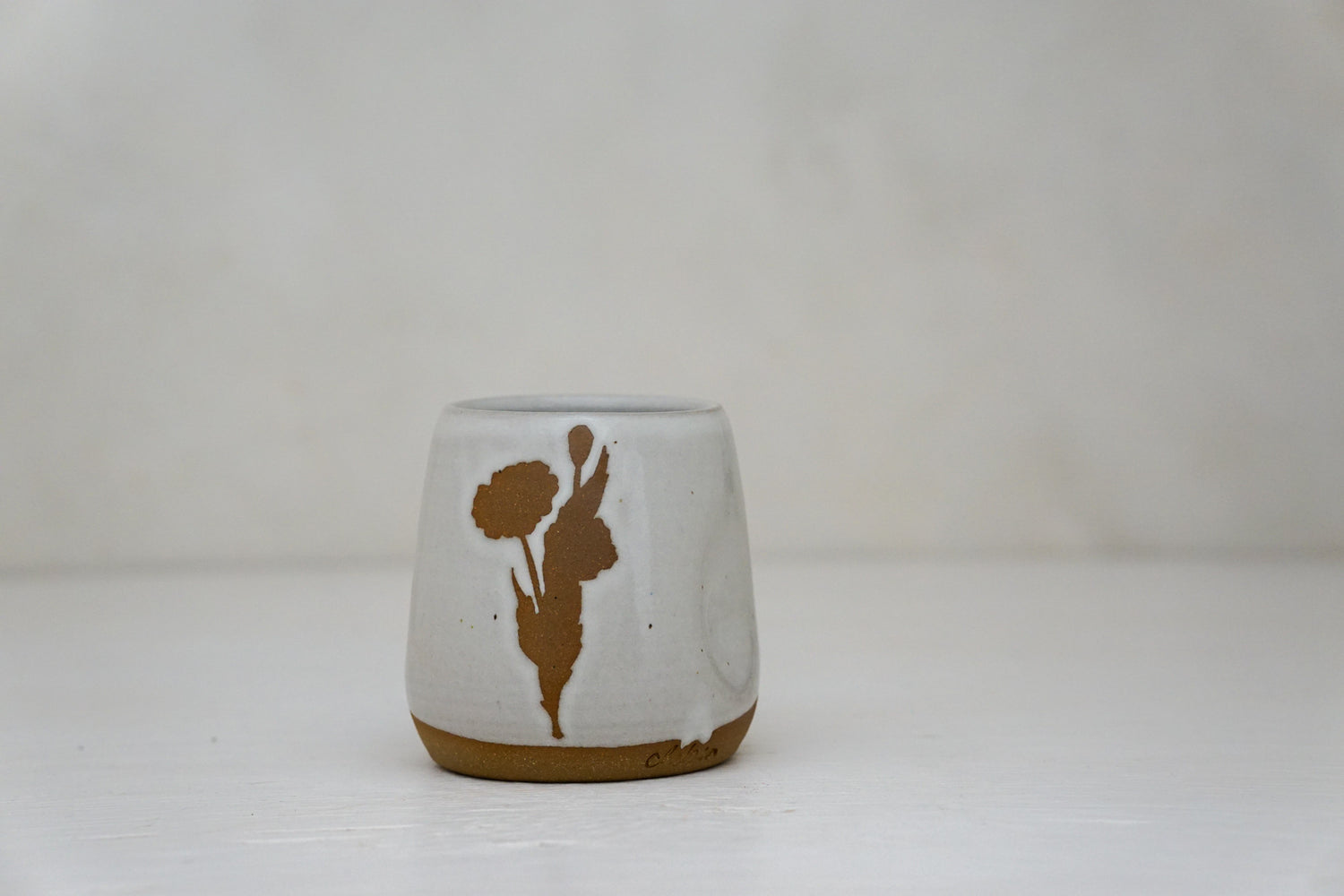 Brown clay Poppy Cup in White 2