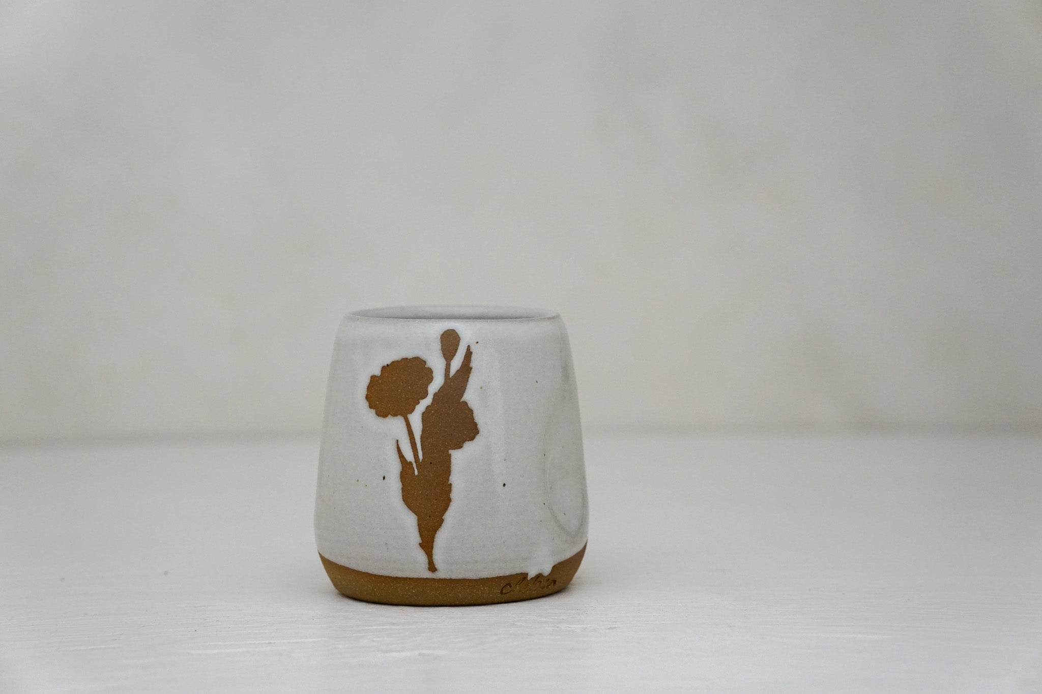 Brown clay Poppy Cup in White 2