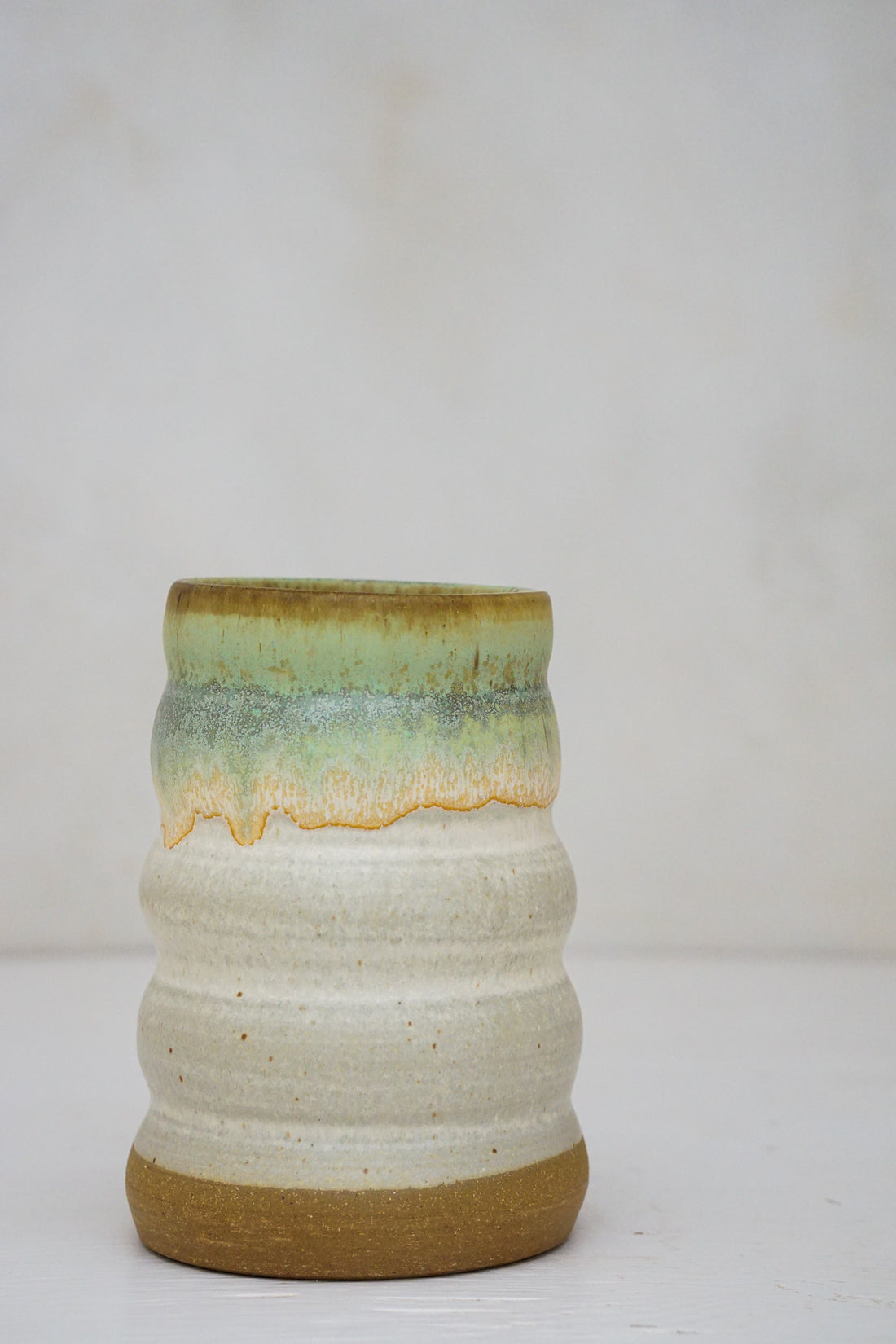 Rippled Vase in Limestone and Geyser