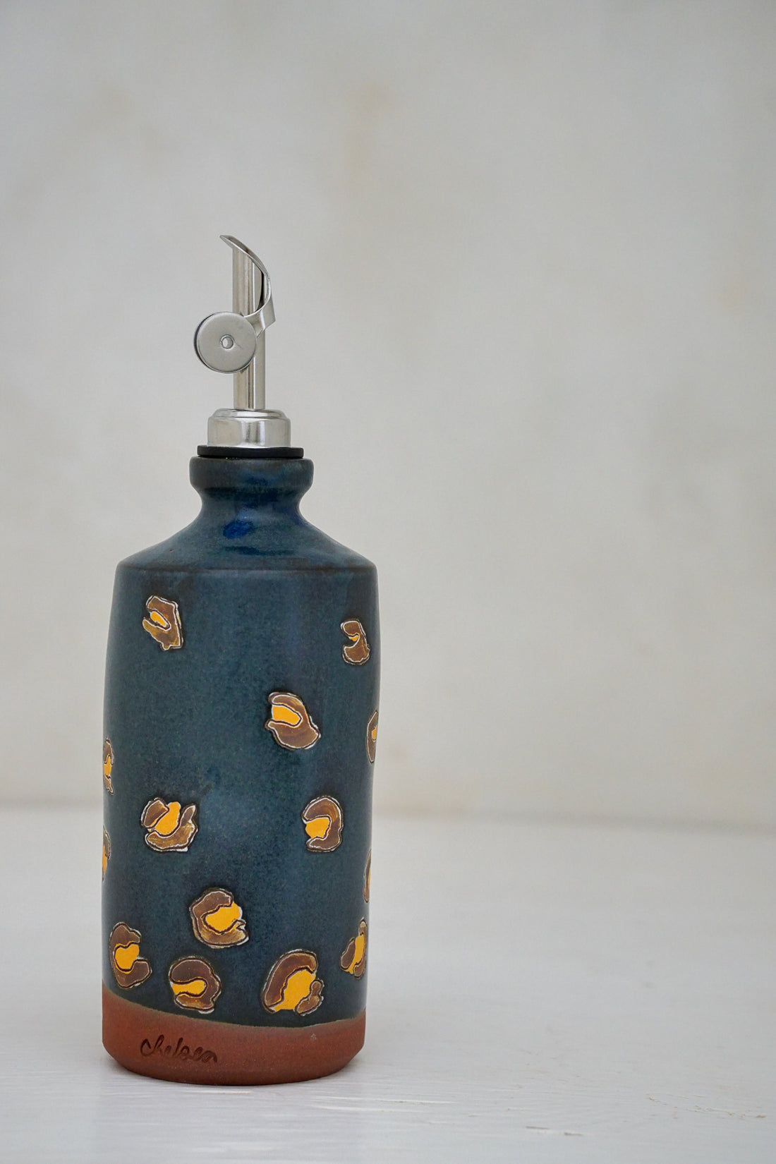 Cheetah print olive oil bottle in Darby
