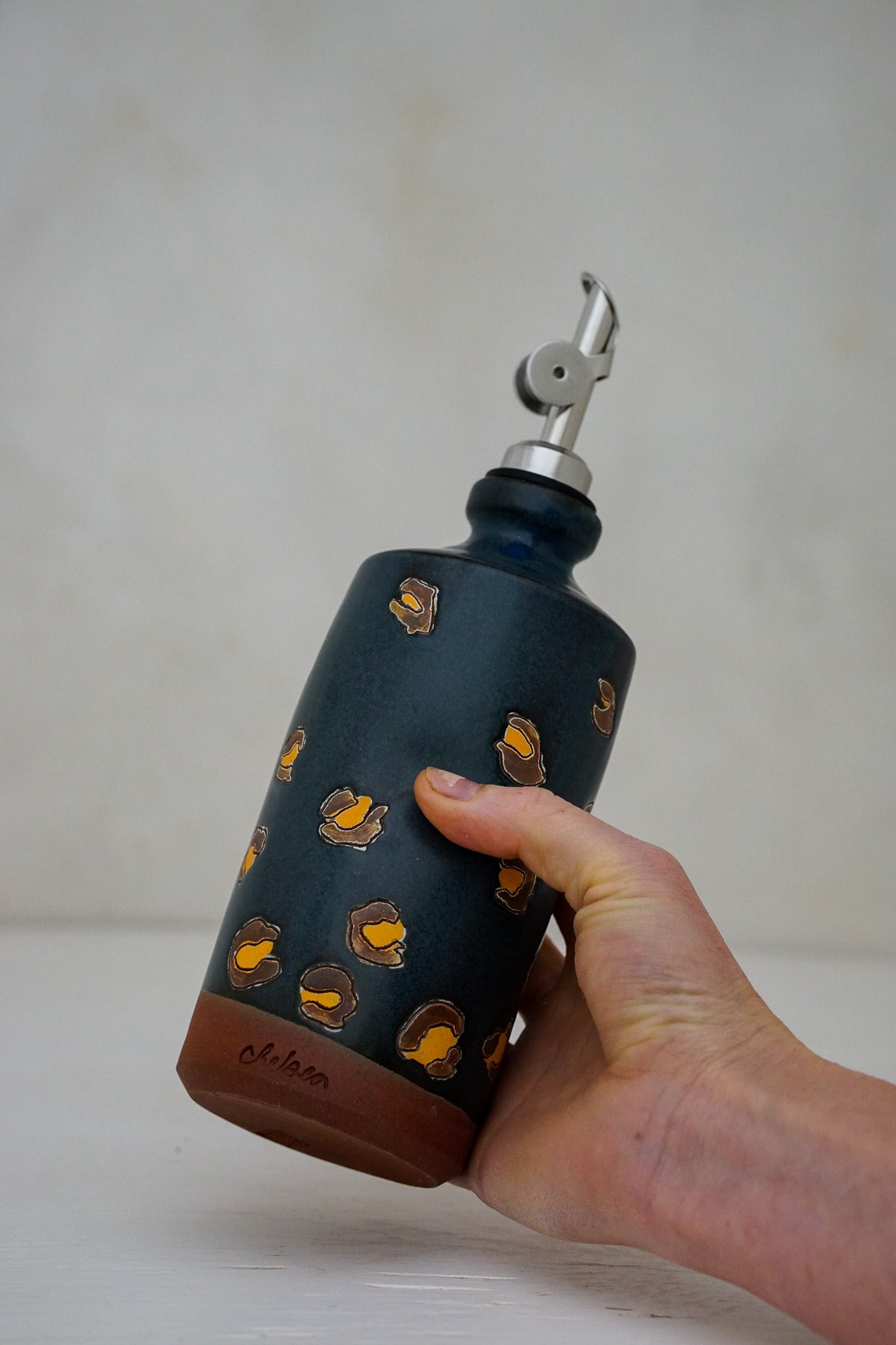 Cheetah print olive oil bottle in Darby