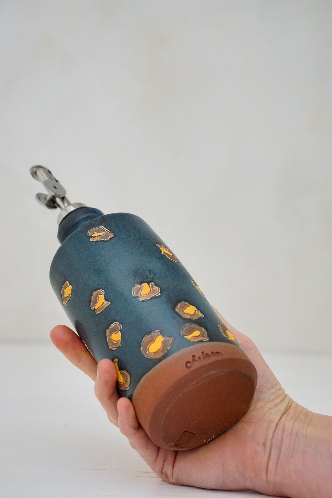 Cheetah print olive oil bottle in Darby
