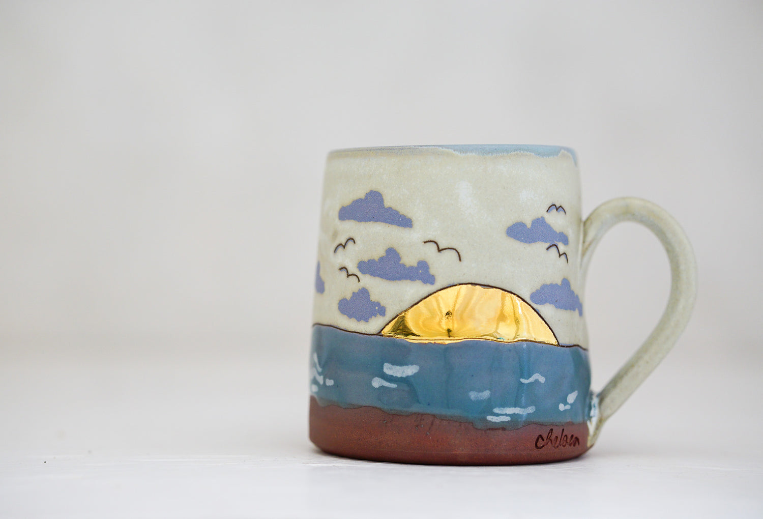 Waves roll in mug in Bone