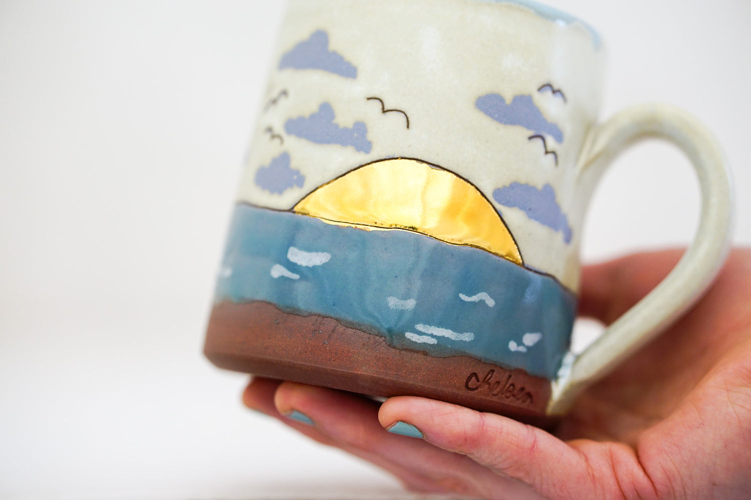 Waves roll in mug in Bone