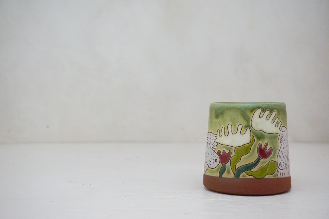 Moose smelling Flowers mug in Sage
