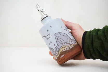 E Teton dipper Olive Oil pour